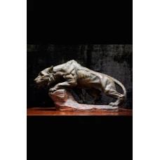 Antique carved lion sculpture by R. Autilic